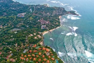 Aerial of seaside fishermen village in Sri lanka