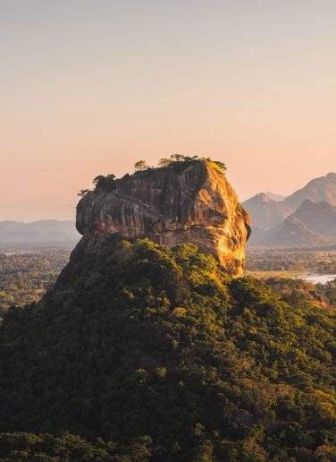 Landscape with Sigiriya rock at sunset in Sri Lanka